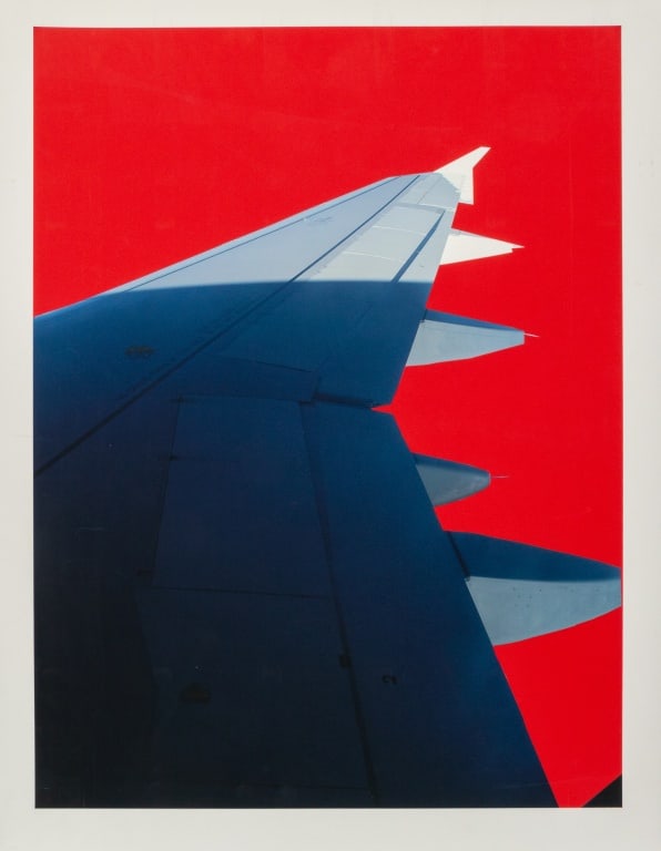 Anne Sager Airplane Wing on Red Chromogenic Print: Anne Sager (American, 1930-2024), Airplane Wing, Chromogenic Print in Colors, with artist's estate stamp verso, unframed. Image: 20" H x 15" W; sheet: 22" H x 17" W. Provenance: From a 35 East 75th