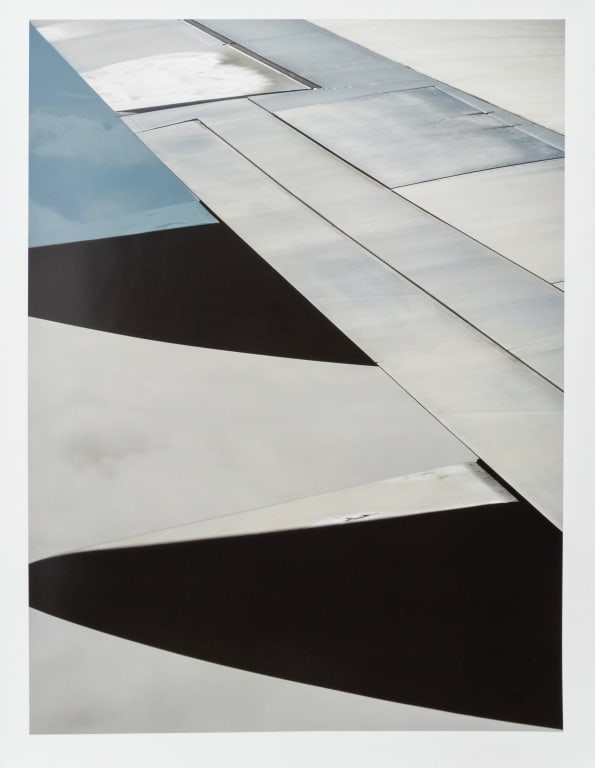 Anne Sager Airplane Wing Chromogenic Print: Anne Sager (American, 1930-2024), Airplane Wing, Chromogenic Print in Colors, with artist's estate stamp to verso, unframed. Image: 20.25" H x 15.25" W; sheet: 22" H x 17" W. Provenance: From a 35