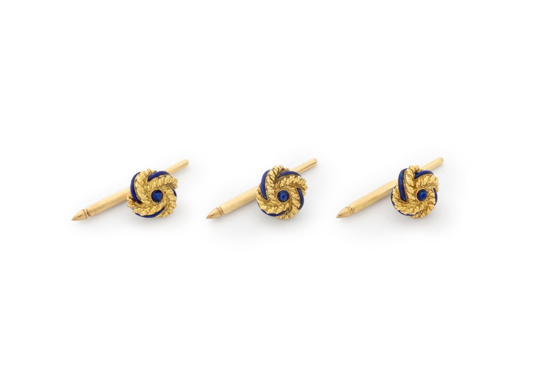 Knot Form Blue Enameled Yellow Gold Shirt Stud Set: Knot Motif Blue Enameled 18K Yellow Gold Shirt Stud Set, featuring three shirt studs designed as twisted wire rope knots decorated with applied cobalt enamel, worn through button holes with spring act