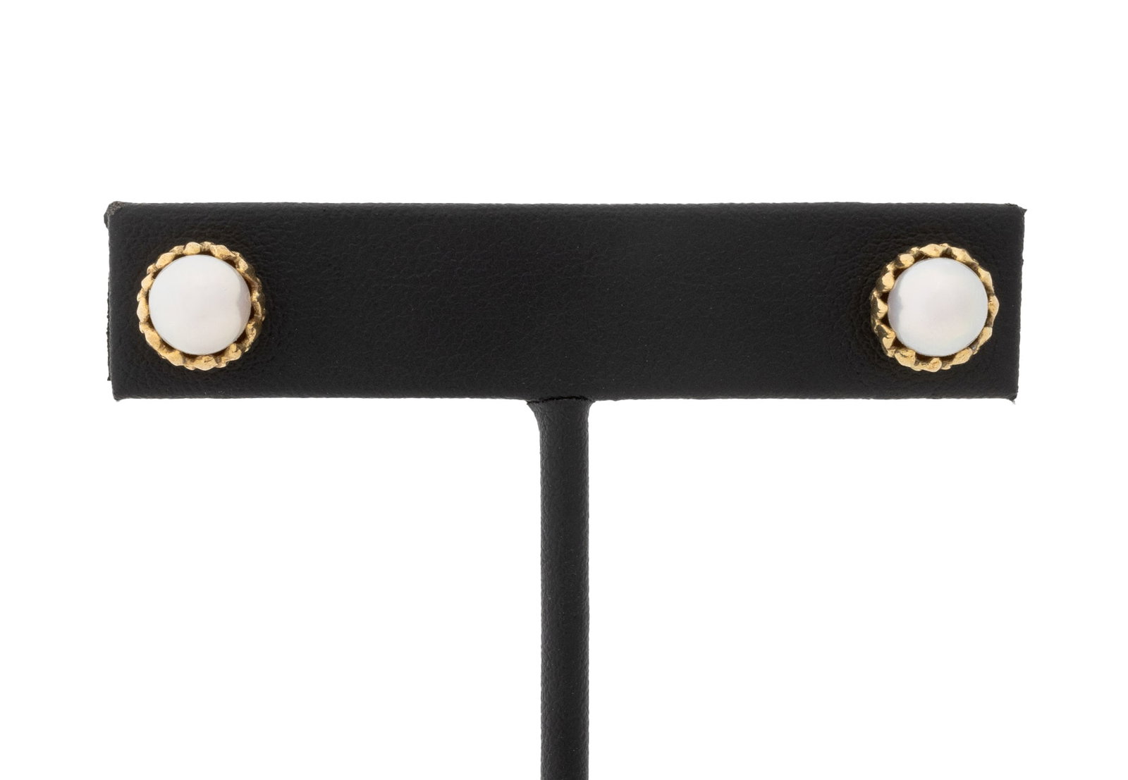 Cultured Pearl Stud and 18K Yellow Gold Earrings: Pair of 18K Yellow Gold and Cultured Pearl Stud Earrings, adorned with two bezel set round cultured pearls approx. 6.5 - 7.0 mm, worn through pierced earlobes with posts and friction backs, marked: "1