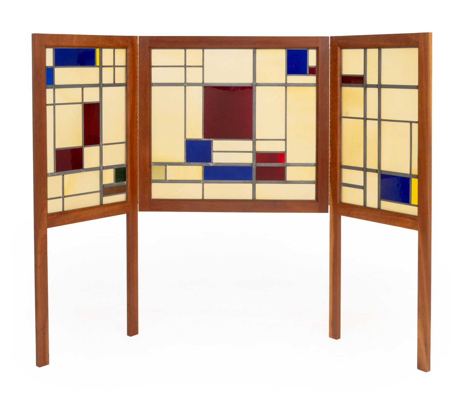 Frank Lloyd Wright Style Glass Panel Floor Screen: Frank Lloyd Wright Style Mahogany and Glass Panel Folding Floor Screen, with geometric frosted, cobalt blue, red glass panels, on four supports. Overall: 66.5" H x 94" W x 1.5" D. Provenance: From an 