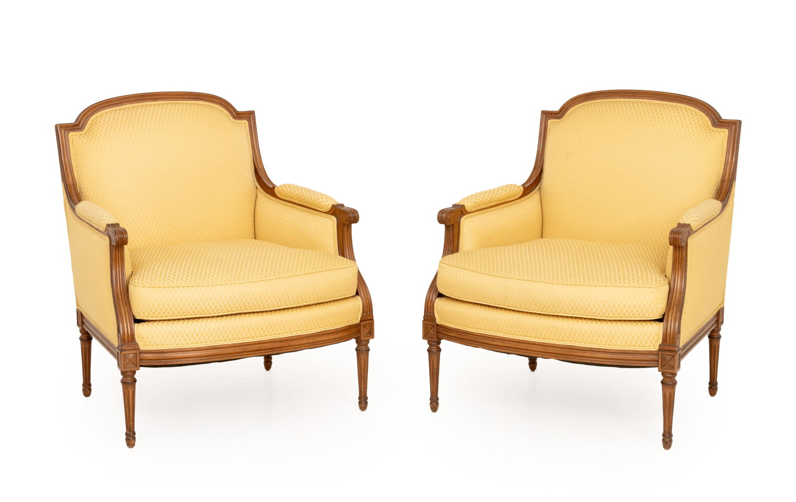 Louis XVI Style Upholstered Walnut Bergeres, Pair: Pair of Louis XVI Style Yellow Silk Upholstered Walnut Bergeres. 38" H x 31" W x 32" D; seat: 20" H. Provenance: From a Park Avenue Collection. Keywords: Vintage Furniture, Armchairs, Occasional