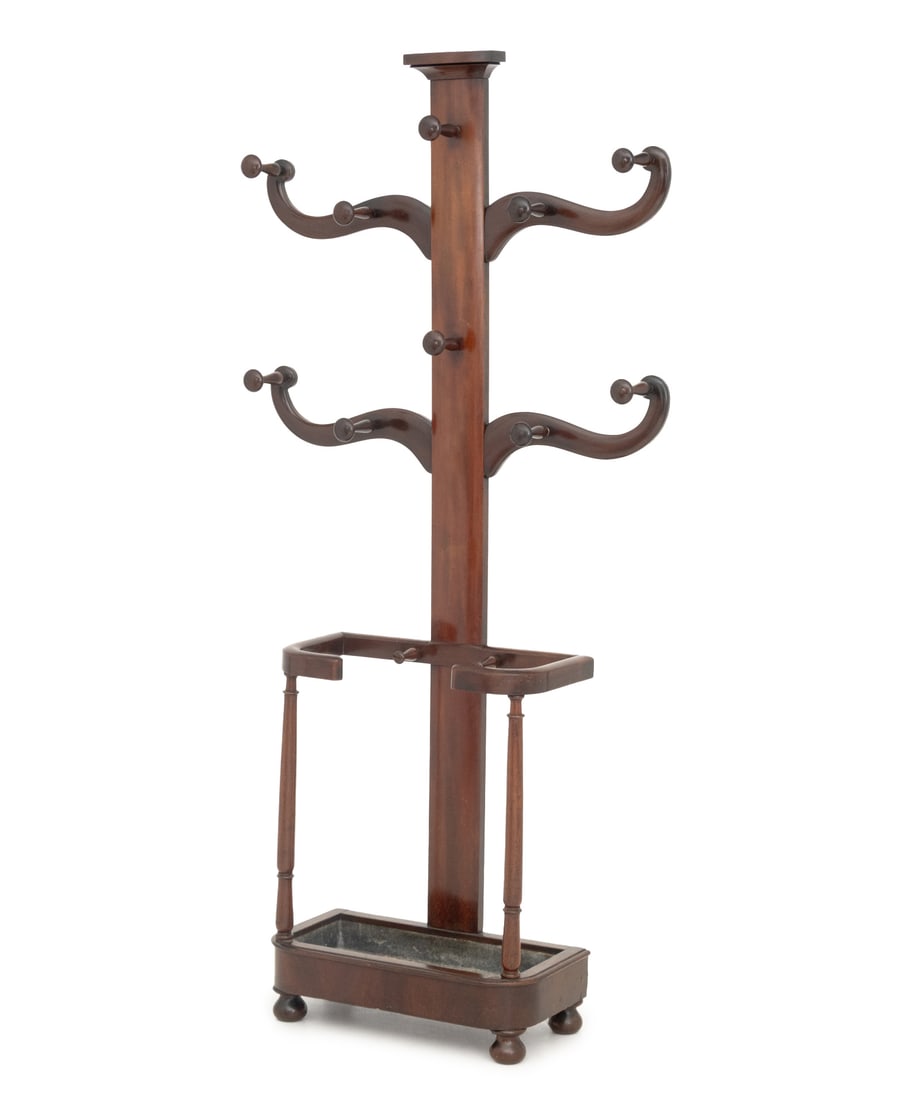 Victorian Mahogany Hall Tree: Victorian Mahogany Hall Tree, late 19th century, with ten coat hooks and tin lined umbrella stand base. 78" H x 36.5" W x 12.25" D. Provenance: From a Roxbury, Connecticut Collection. Keywords: Antiqu