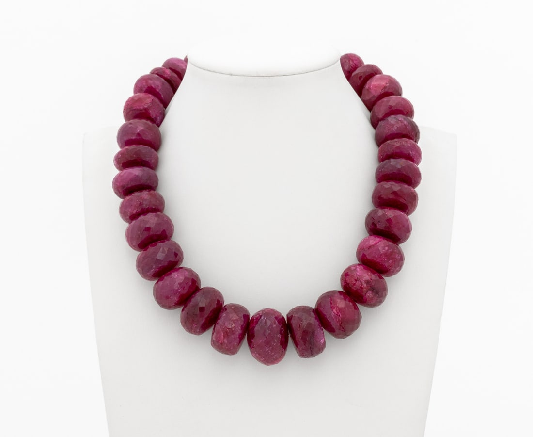 Large Faceted Ruby Bead Necklace, 22K Gold Clasp: Large Faceted Ruby Beaded Necklace with 22K Yellow Gold Clasp, featuring thirty one fully drilled ruby beads weighing a total of approx. 1680.00 carats, graduated beads measuring approx. 18.0 x 6.0 mm