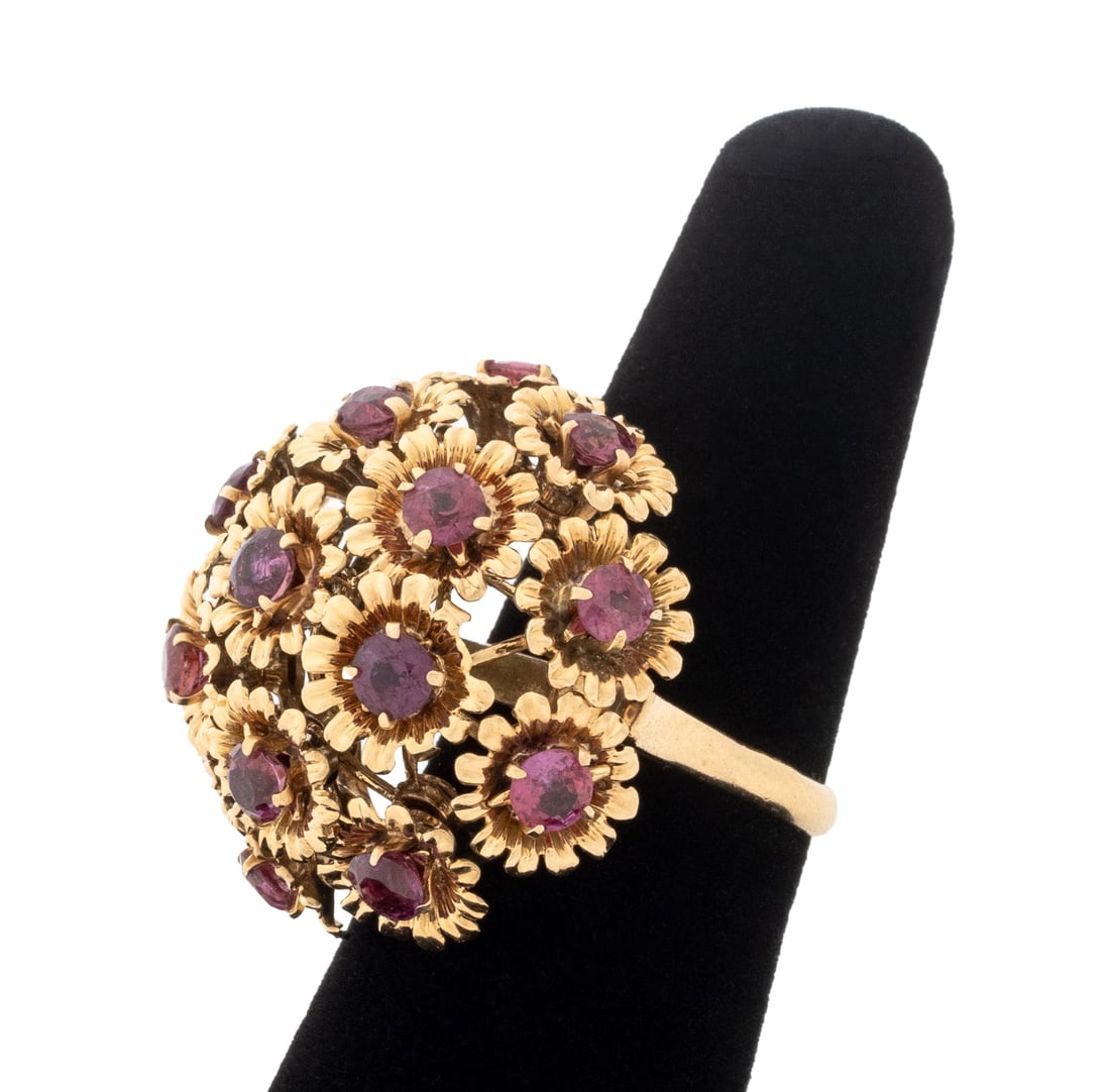 Vintage Ruby and Rose Gold Sputnik Ring: Vintage 14K Rose Gold and Ruby Sputnik Ring, featuring sixteen prong set round faceted rubies, weighing a total of approx. 3.50 carats, rubies settings en Tremblant, marked: "14K". Measuring approx. U