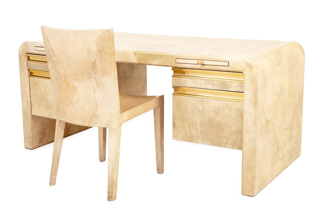 Karl Springer Goatskin Desk and Chair, ca. 1970: Karl Springer (German/American, 1931-1991) Goatskin Covered Wood Desk and Chair, circa 1970, the waterfall form with two pull-out writing surfaces above two shorts drawers and two file cabinets on