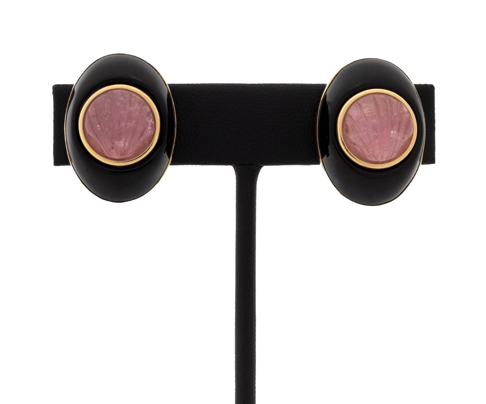 Yellow Gold, Pink Tourmaline, and Onyx Earrings: 14K Yellow Gold, Pink Tourmaline, and Onyx Earrings, designed as oval shaped earrings, adorned with two bezel set fluted pink tourmaline round cabochons weighing a total of approx. 14.00 carats, surro