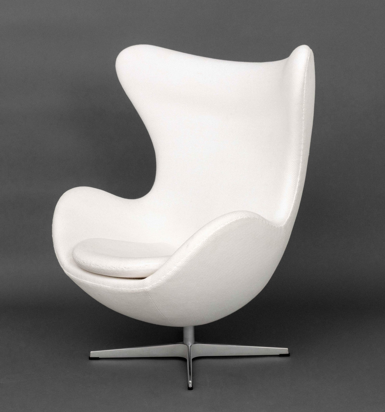 Fritz Hansen White Fabric Upholstered Egg Chair: Fritz Hansen White Fabric Upholstered Egg Chair, label to seat. 31" H x 34" W x 27" D; seat: 14.5" H. Provenance: From a One Central Park West Estate. Keywords: Danish Modern Furniture, Seating, Club 