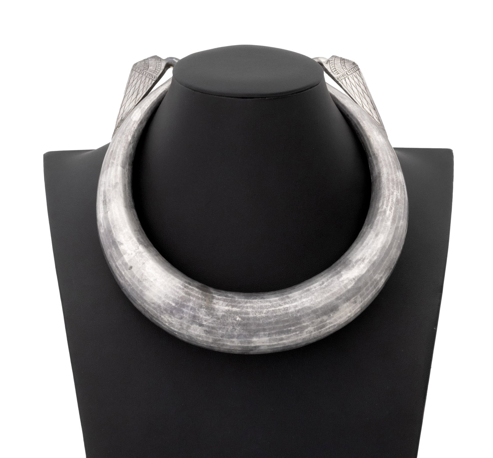Hmong Silver Xauv Torque Necklace: Hmong Silver Xauv Torque Necklace, the ends with two stylized wings. Weight: 13.72 ozt.; 7.5" L x 4.5" W. Provenance: From the Estate of Jewelry Designer Irena Corwin. Keywords: Antique Jewelry, Asian