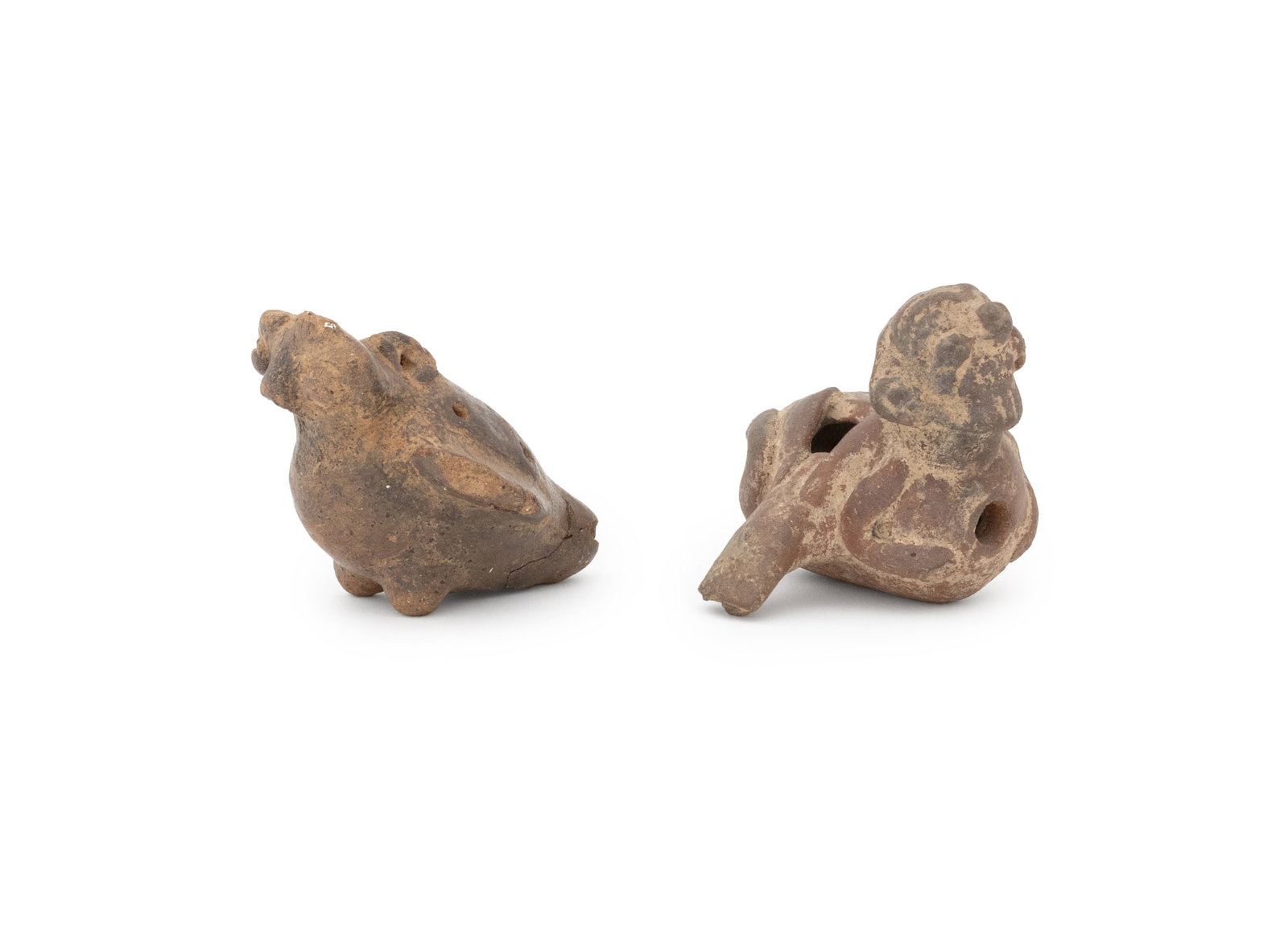 Pre-Columbian Zoomorphic Pottery Ocarinas, 2: Collection of Two Pre-Columbian Zoomorphic Pottery Ocarinas, one in the form of an owl, probably Oaxacas, and one in the form of a mythical beast. Larger: 2.5" H x 3.5" W x 2.75" D. Provenance: From a