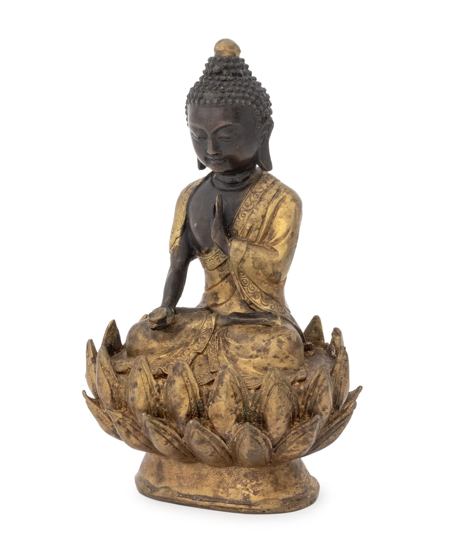 Sino-Tibetan Buddha Shakyamuni Bronze Sculpture: Chinese Tibetan Buddha Shakyamuni Patinated and Gilt Bronze Sculpture, the figure seated atop a double lotus pedestal and holding a bowl in his right hand. 8.25" H x 5" W x 3.75" D. Provenance: From a