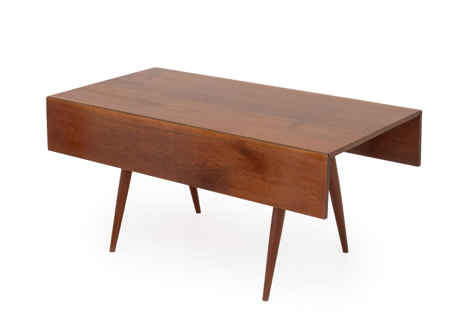 George Nakashima Walnut Drop Leaf Table, 1962: George Nakashima (American, 1905-1990) American Walnut Drop Leaf Table, 1962, on four tapered legs, accompanied by an original drawing. 28.5" H x 60" W x 30.5" D; leaf: 10" W. Provenance: Commissioned