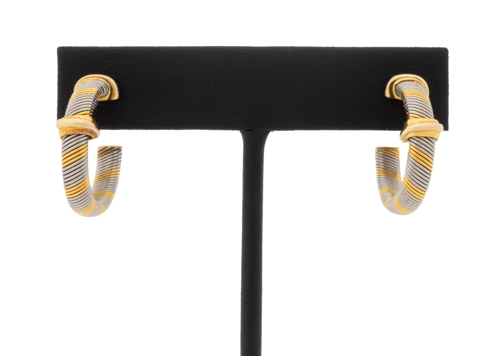 Cartier Creoles Trinity 18K Gold & Steel Earrings: Cartier Creoles Trinity Motif 18K Gold and Steel Earrings, designed as hoop earrings, featuring 18K rose, white and yellow gold Trinity motifs, worn through pierced earlobes with posts and alpa