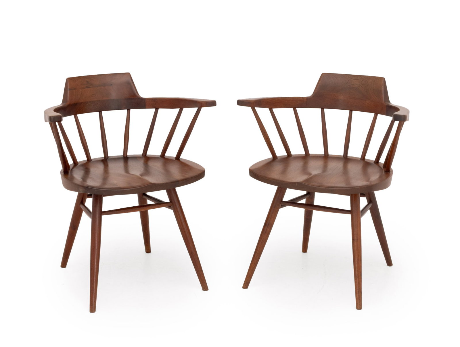 George Nakashima Walnut Captain's Armchairs, Pair: George Nakashima (American, 1905-1990) Pair of American Walnut Captain's Arm Chairs, 1962, with spindle backs on turned wood legs, together with copy of receipt. 28.25" H x 23.5" W x 17.5" D; seat: 17