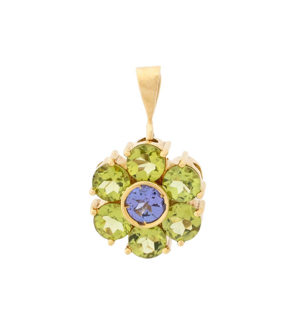 18K Yellow Gold, Tanzanite, and Peridot Pendant: 18K Yellow Gold, Tanzanite, and Peridot Pendant, featuring one nick prong set round faceted tanzanite weighing approx. 0.30 carat, further decorated with six prong set round faceted peridot weighing a