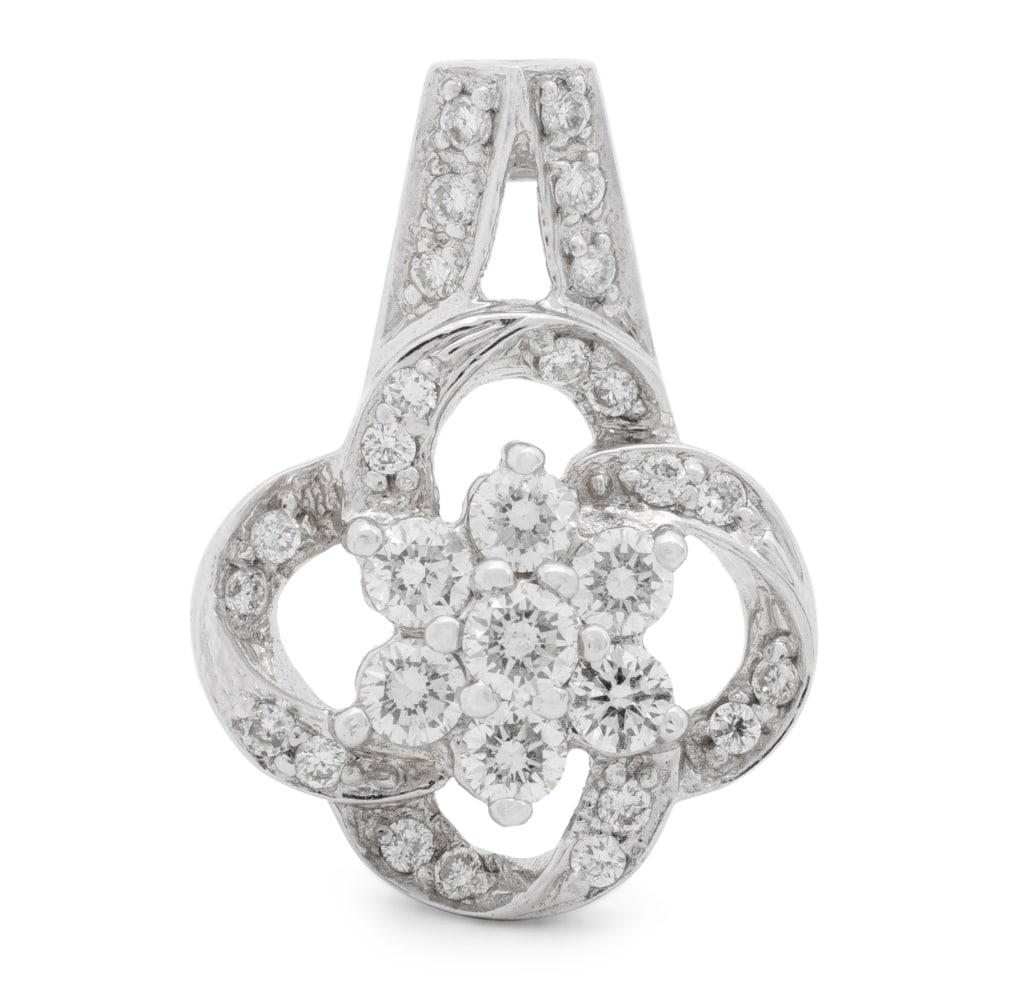 Vintage White Gold and Diamond Cluster Pendant: Vintage 14K White Gold and Diamond Cluster Pendant, adorned with 33 diamonds weighing approx. 0.57 carat, marked: "DE 14K". Measuring approx. 3/4" x1/2"; depth: 5.25mm; weight: 1.10 dwt. Provenance: F
