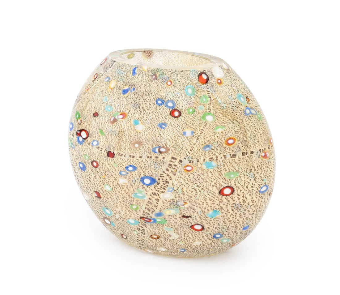 Luigi Mellara Murano Art Glass Vase: Luigi Mellara (Italian, b. 1952) Murano Art Glass Vase, with millefiori and gold leaf design, signed to underside. 9" H x 10.25" W x 5" D. Provenance: From a Fort Lauderdale, Florida Estate. Keywords: