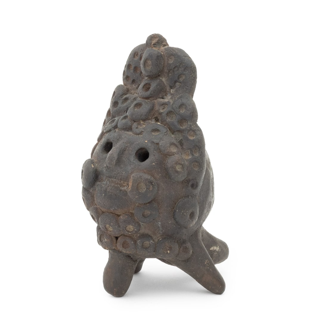 Taino Pre-Columbian Anthropomorphic Ocarina: Taino Pre-Columbian Anthropomorphic Pottery Ocarina, in the form of a goddess atop three feet. 4.25" H x 2.5" Diameter. Provenance: From an Upper West Side Estate. Keywords: Caribbean Art, Arawak, Pre