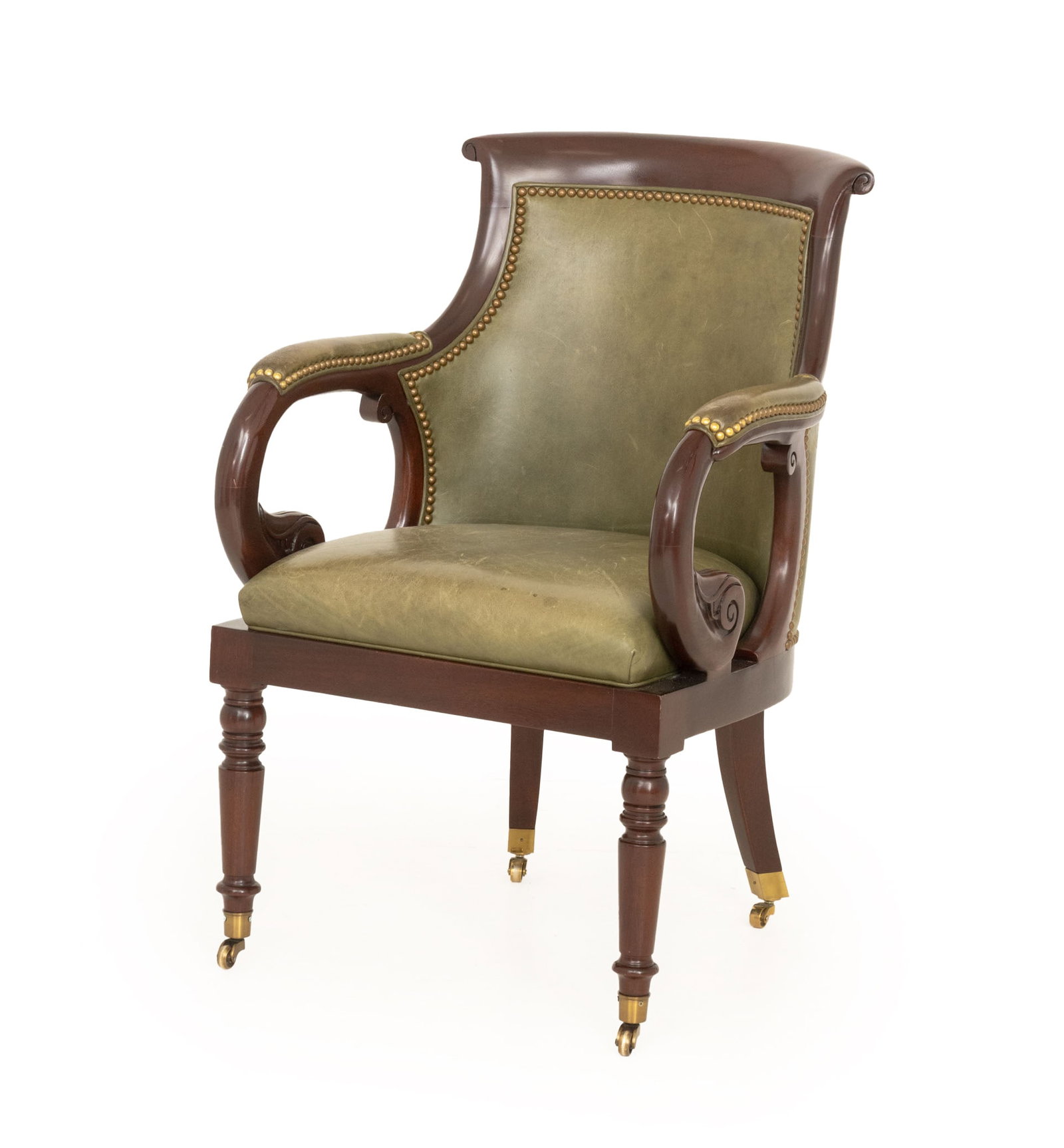 Hancock & Moore Jockey Club Chair: Hancock and Moore Jockey Club Chair, with studded brass nailhead trim, olive green leather upholstery, and atop casters, label to underside. 35" H x 24" W x 24" D; seat: 19" H. Provenance: From a Park