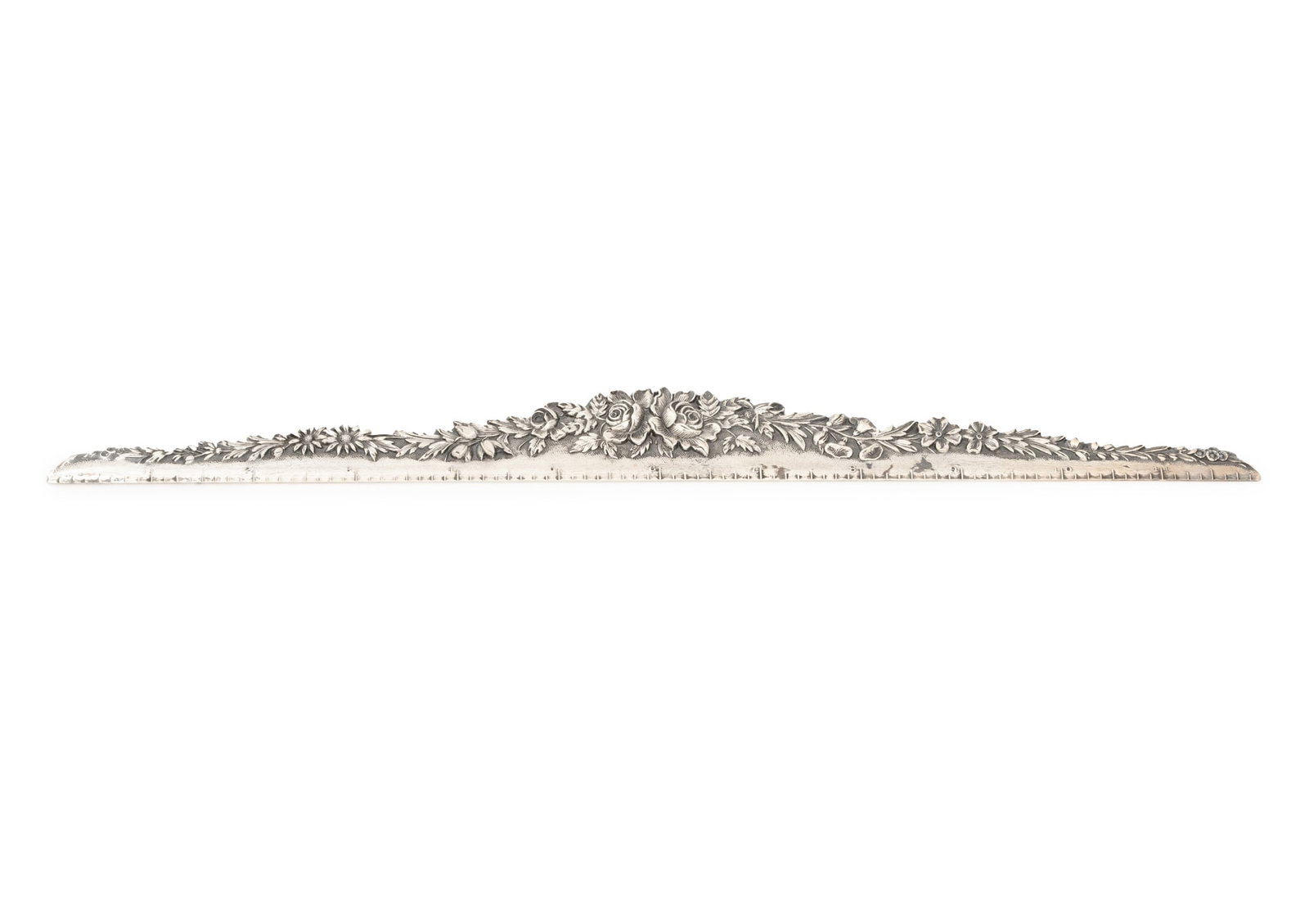 American Sterling Silver Floral Motif Ruler: American Sterling Silver Floral Embossed Ruler, marked "S. Kirk & Son / Sterling". Weight: 3.08 ozt.; 12" L x 1.25" W. Provenance: From a 500 Park Avenue Estate. Keywords: Vintage silver, Silversmith,