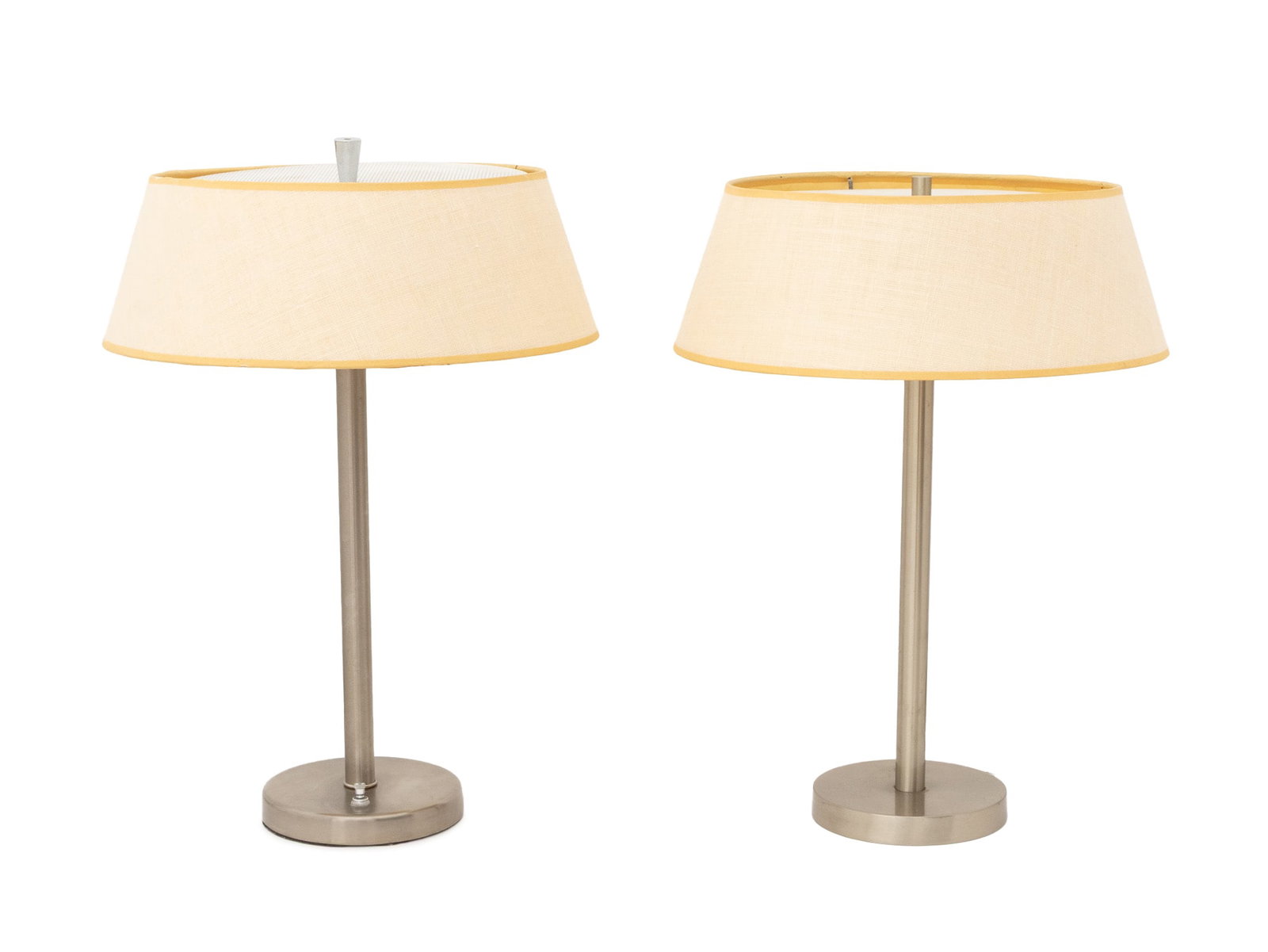 Nessen Mid-Century Modern Table Lamps, Pair: Pair of Nessen Mid-Century Modern Table Lamps, each with satin chrome base and original linen shade, with "Nessen Lighting" label to light socket. 20" H x 14" Diameter. Provenance: The Morningside Hei