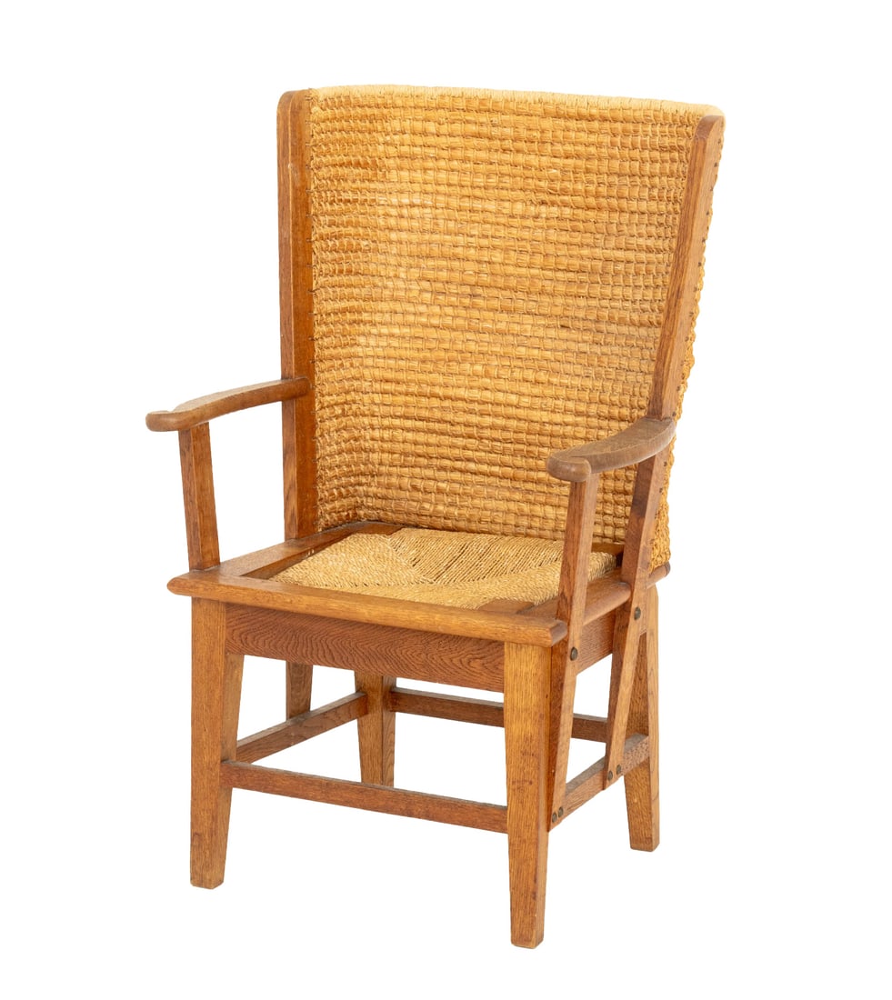 Orkney Highland Oak and Straw Back Armchair: Orkney Highland Oak and Straw Back Arm Chair, with drop-seat and stamped "D.M. Kirkness / Of Kirkwall, Orkney / Made in Scotland" and "R&E" to underside. 33.5" H x 20.5" W x 15" D; seat: 14" H.