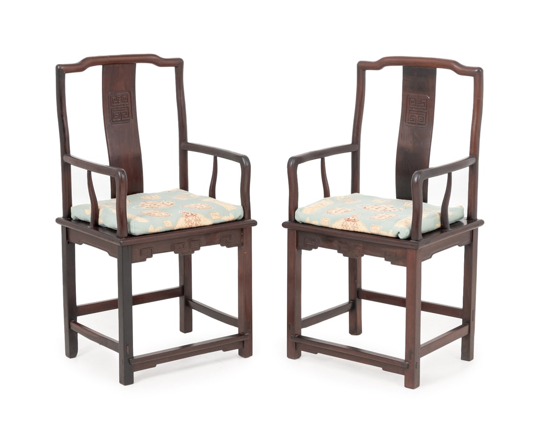 Chinese Hongmu Armchairs, Pair: Pair of Chinese Hongmu Arm Chairs, with teapot and vessel motif needlepoint cushions. 42" H x 21.75" W x 17.5" D; seat: 20" H. Provenance: From an East 74th Street Estate. Keywords: Chinese Furniture,