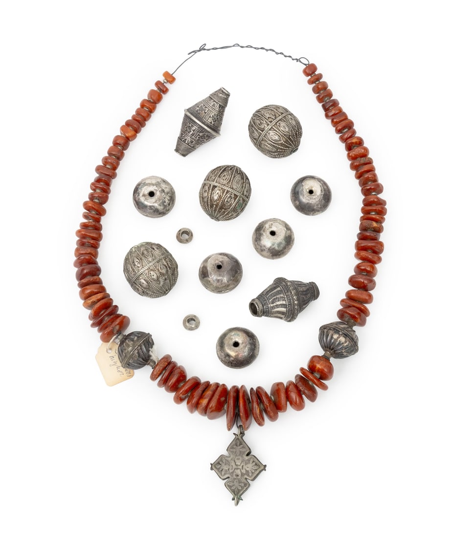 Collection of Silver and Amber Beads: Collection of Silver and Amber Beads, including Yemeni silver beads. Weighable silver: 3.76 ozt.; largest bead: Provenance: From the Estate of Jewelry Designer Irena Corwin. Keywords: Vintage Jewelry,