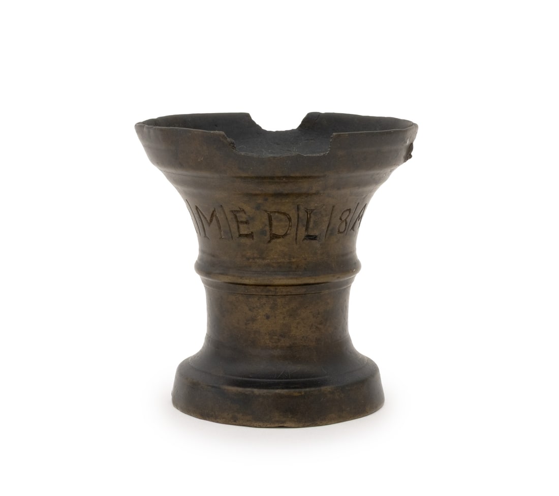 Apothecary Patinated Bronze Mortar, 1606: Apothecary Patinated Bronze Mortar, 1606, engraved "R / M / E D / L / 8 A / 1606". 4.25" H x 4" Diameter. Provenance: From the Estate of Gerard Stora, Vice President of Wildenstein Gallery. Keywords: 