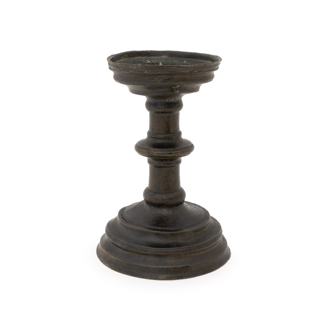 Italian Baroque Bronze Candlestick, 17th C.: Italian Baroque Patinated Bronze Pricket Candlestick, 17th century. 7.25" H x 5" Diameter. Provenance: From the Estate of Gerard Stora, Vice President of Wildenstein Gallery. Keywords: Antiques, Light