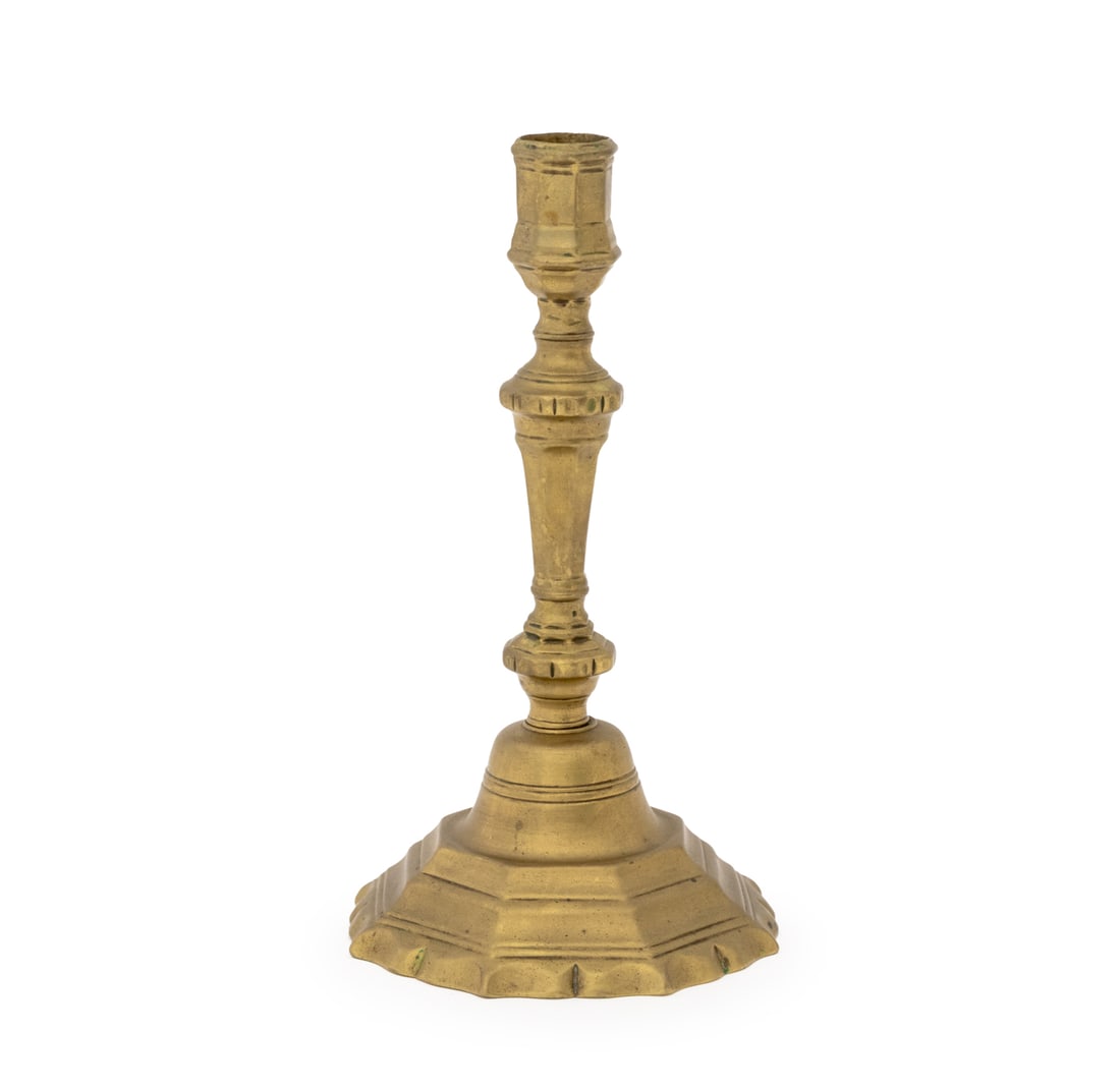 Neoclassical Style Brass Candlestick: Neoclassical Style Brass Candlestick, on bell form base. 9" H x 5" Diameter. Provenance: From the Estate of Gerard Stora, Vice President of Wildenstein Gallery. Keywords: Lighting, Candleholder, Metal