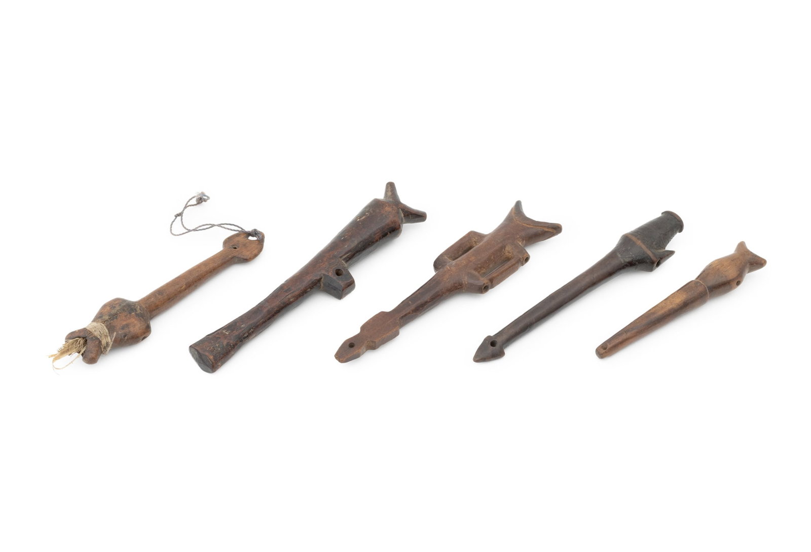 West African Lobi Carved Wood Whistles, 5: Collection of Five West African Lobi Carved Wood Whistles, Burkina Faso. 10" L x 1.75" W. Provenance: From an Upper West Side Estate. Keywords: Musical Instruments, Wind Instrument, African Art, Lobi 