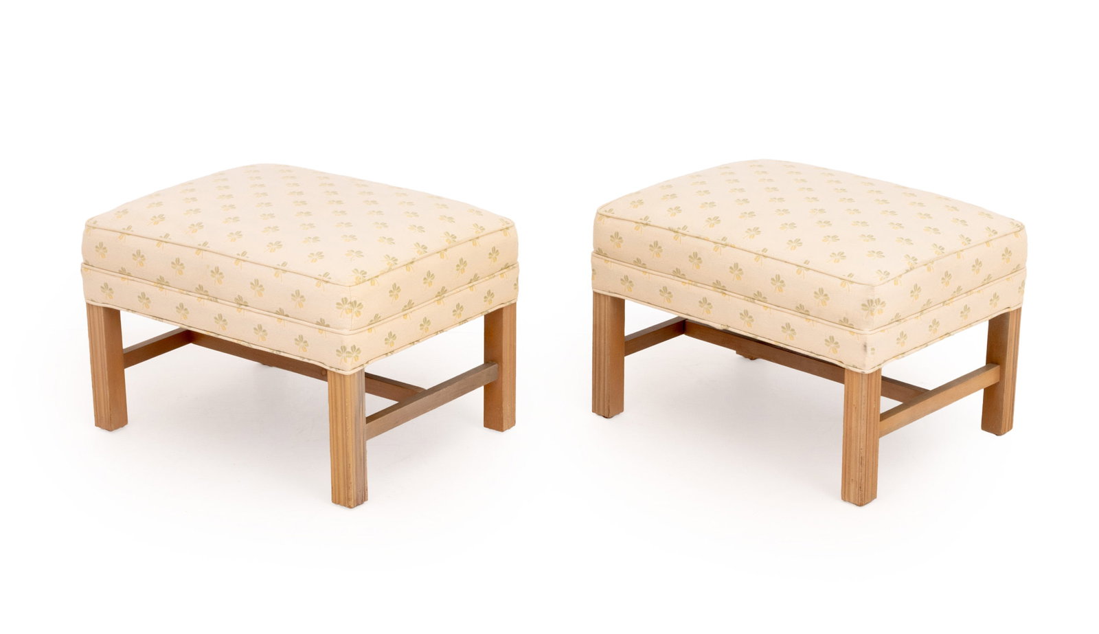 Four-Leaf Clover Pattern Upholstered Ottomans, Pr.: Pair of Modern Four-Leaf Clover Pattern Upholstered Ottomans, atop cerused wood bases. 17" H x 25" W x 19" D. Provenance: From a Roxbury, Connecticut Collection. Keywords: Modern Furniture, Vintage