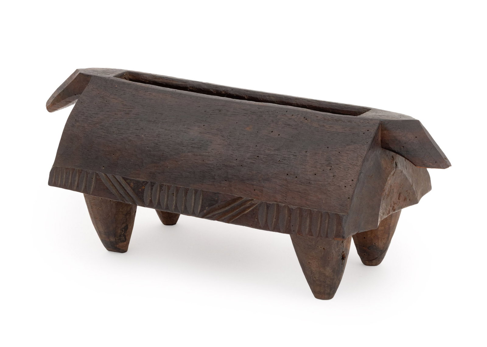 African Hand-Carved Wood Slit Drum: African Hand-Carved Wood Slit Drum, atop four bulbous feet. 8" H x 22.5" W x 9" D. Provenance: From an Upper West Side Estate. Keywords: African Art, Lobola, Musical instruments, Percussion, Gong,