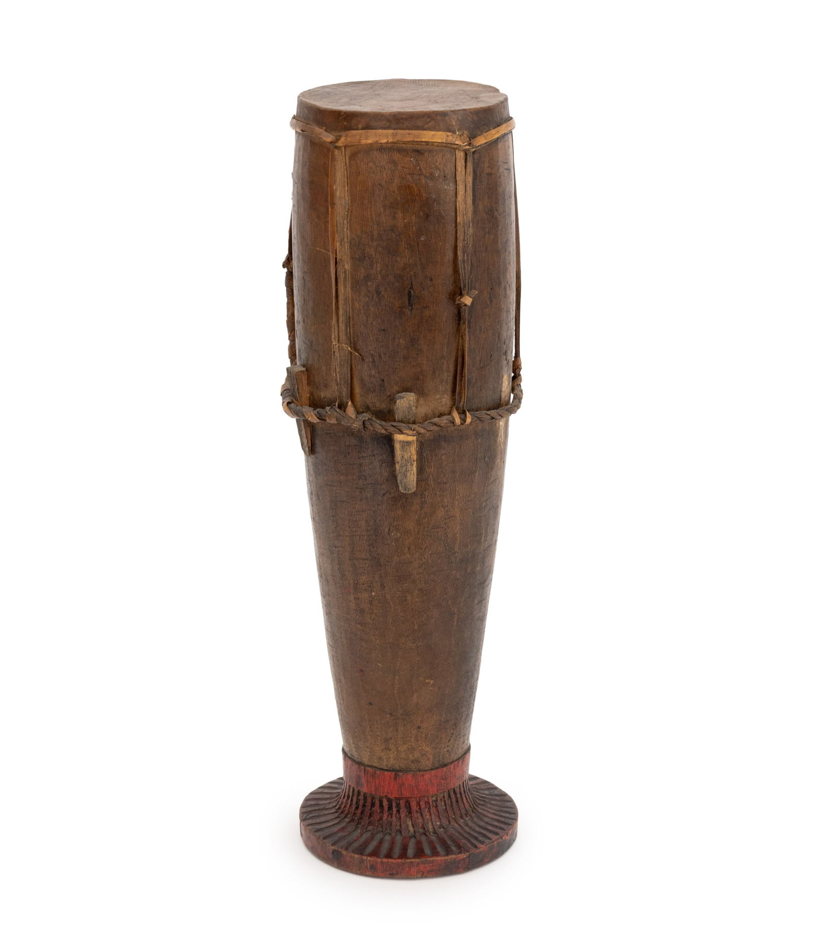 Timor-Leste Hand-Carved Wood Drum: Timor-Leste Hand-Carved Wood Drum, with animal hide top and red-painted and fluted base. 17.75" H x 5.25" Diameter. Provenance: From an Upper West Side Estate. Keywords: Southeast Asian Art,
