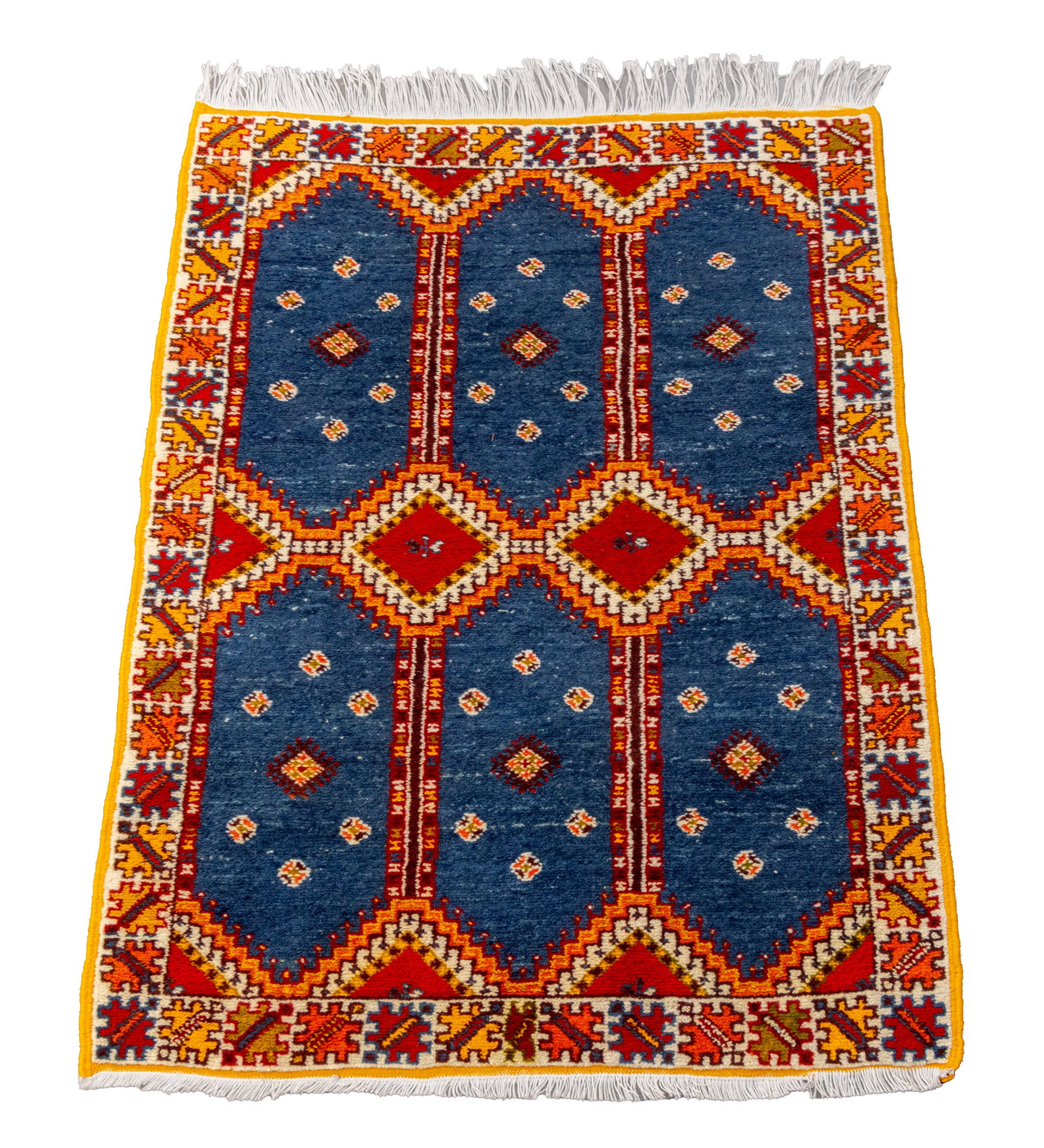 Moroccan Taznakht Rug, 6' 3.75" x 3' 5.25": Moroccan Berber Taznakht Rug, with geometric patterns in yellow and red on a blue ground. 6' 3.75" L x 3' 5.25" W. Provenance: From a New York City Collection. Keywords: African rugs, Wool rugs, Area 