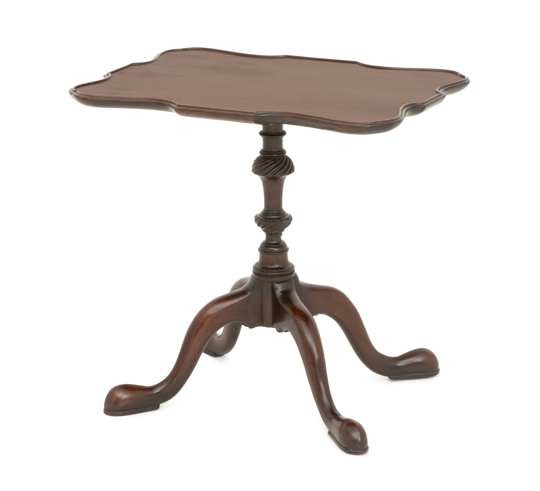 Queen Anne Style Mahogany Pie Crust Top Tea Table: Queen Anne Style Mahogany Pie Crust Top Tea Table, on pedestal base with four cabriole feet. 21.75" H x 23.5" W x 16.5" D. Provenance: From an East 79th Street Estate. Keywords: Antique Furniture, Eng