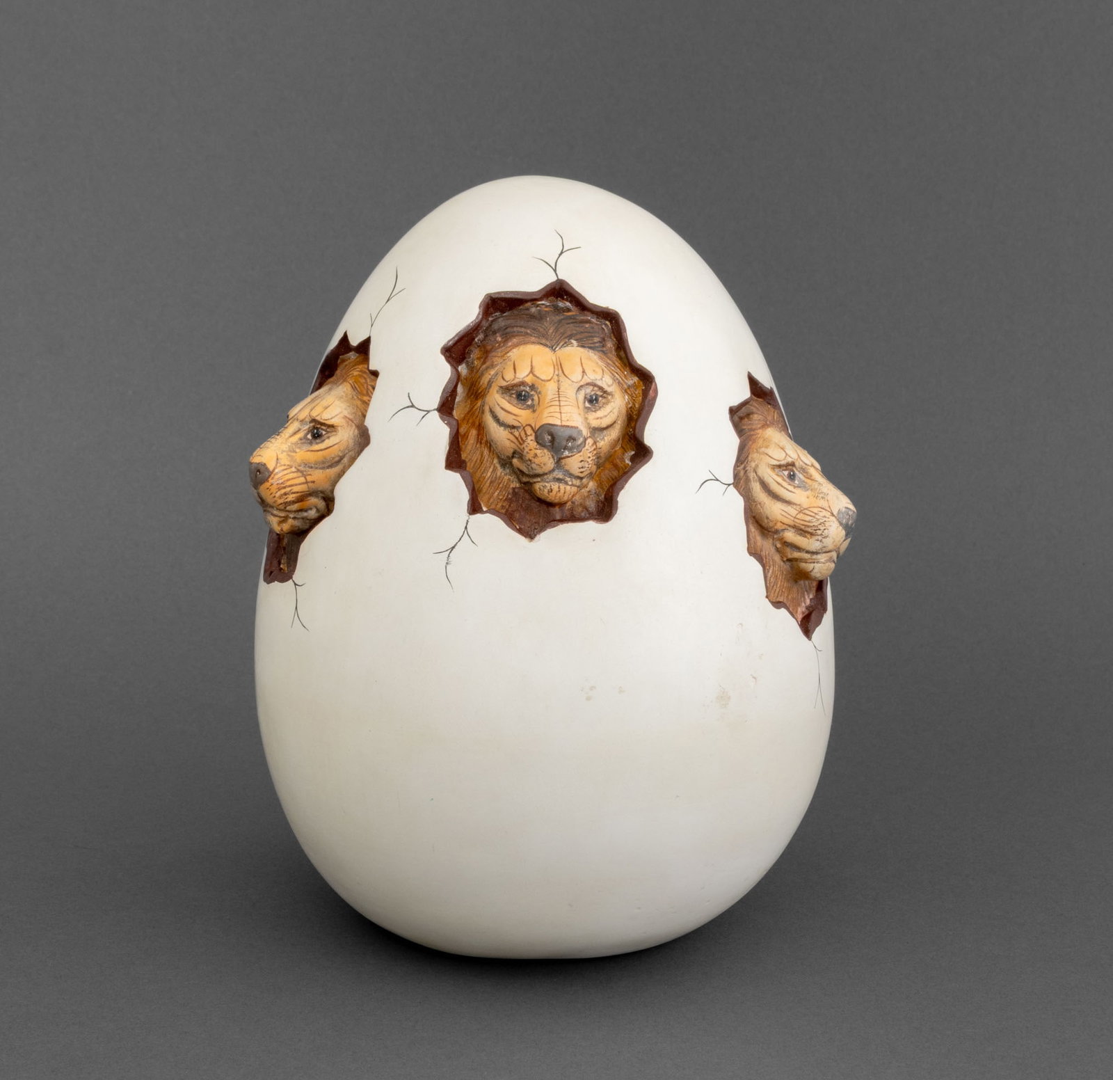 Teodoro Valdovinos Lions Hatching from an Egg: Teodoro Valdovinos (Mexican, XX) Three Lions Hatching from an Egg Sculpture, hand-painted ceramic, signed and marked "Mexico" to underside. 8.25" H x 6.25" W x 5.75" D. Provenance: From a New York Cit