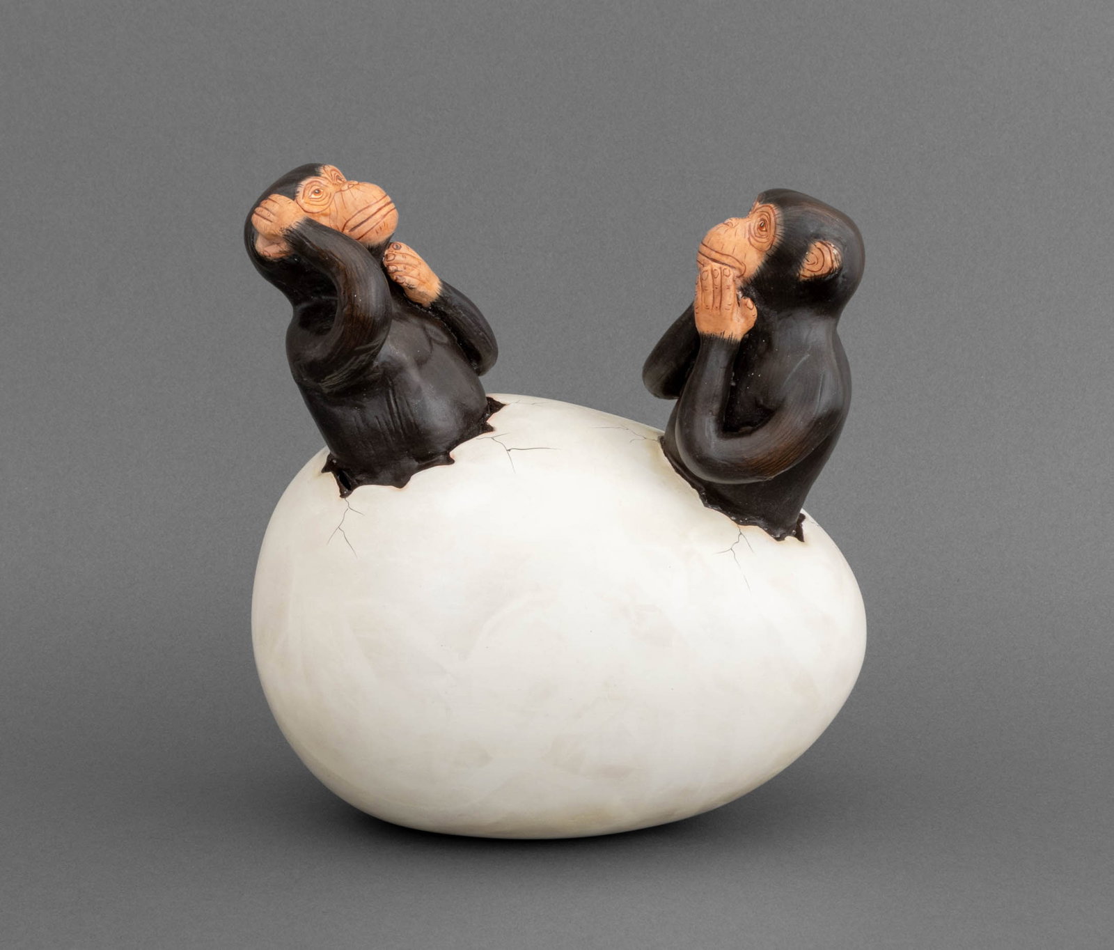 Teodoro Valdovinos Monkeys Hatching from an Egg: Teodoro Valdovinos (Mexican, XX) Two Monkeys Hatching from an Egg Sculpture, hand-painted ceramic, signed and marked "Mexico" to underside. 8.75" H x 7.75" W x 5.25" D. Provenance: From a New York Cit