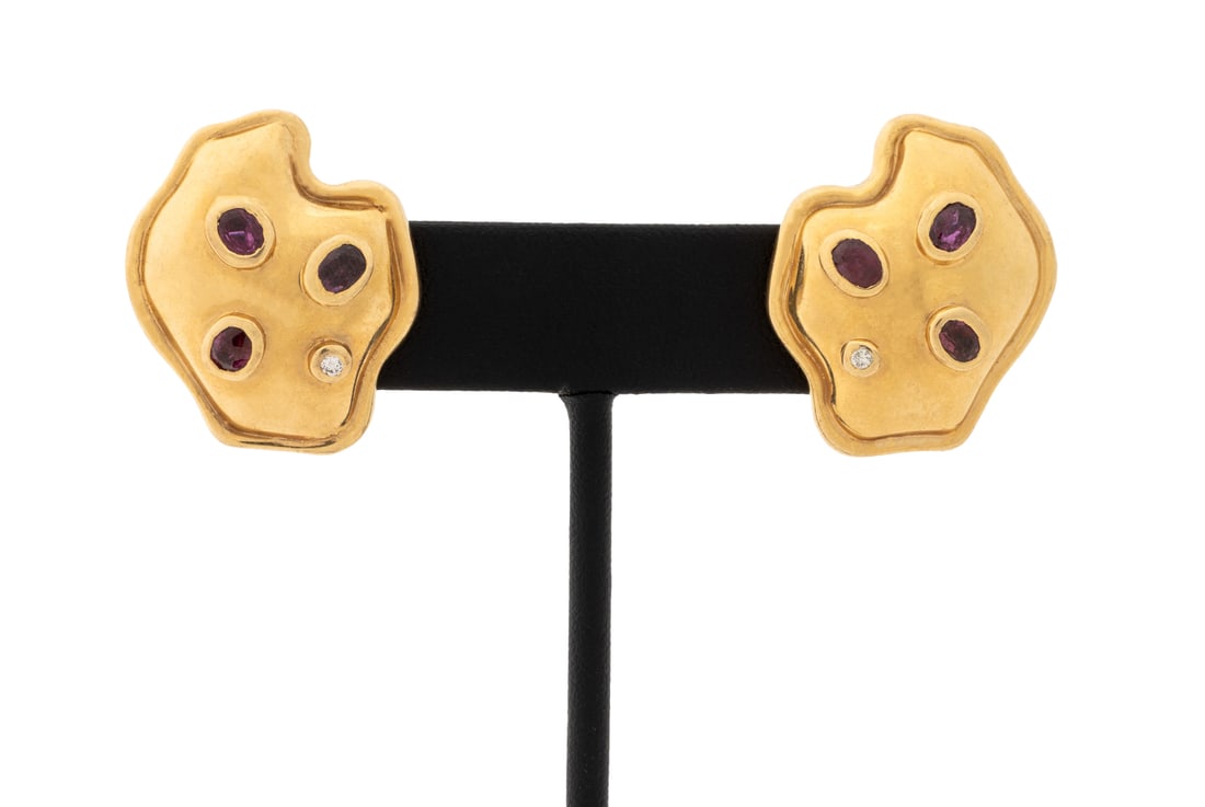 Modern Yellow Gold, Ruby, and Diamond Earrings: Pair of Modern 14K Yellow Gold, Ruby, and Diamond Earrings, brightly polished, featuring six bezel set oval brilliant rubies weighing a total of approx. 2.00 carats, further adorned with two bezel set