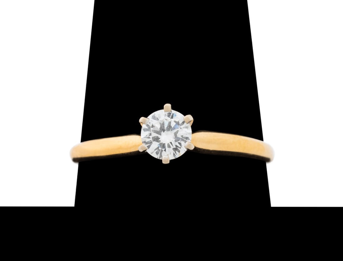 Yellow Gold, White Gold, & Diamond Solitaire Ring: 14K Yellow Gold and White Gold and Diamond Solitaire Engagement Ring, with one 0.37 carat round brilliant cut diamond, color F, clarity SI1, marked: "14K LP / IGI 2216445 / .37" with maker's mark. US