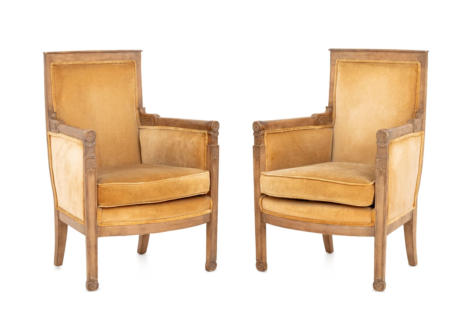 Restauration Style Fruitwood Bergeres, Pair: Pair of Restauration Style Fruitwood Bergeres, with golden velvet upholstery and carved rosette motif. 36.25" H x 25" W x 21" D; 18" H. Keywords: Vintage Furniture, Seating, Occasional chairs,