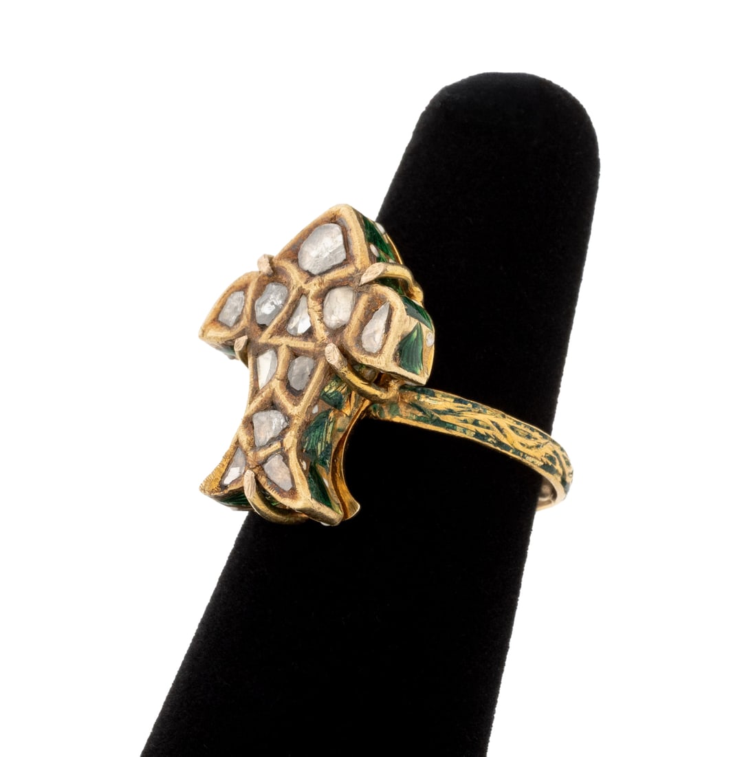 Bird Form Yellow Gold, Enamel, and Diamond Ring: Bird Motif 18K Yellow Gold, Diamond, and Enamel Ring, featuring eleven bead set table cut diamonds weighing a total of approx. 0.15 carat., further decorated with green and white applied enamel. Gold