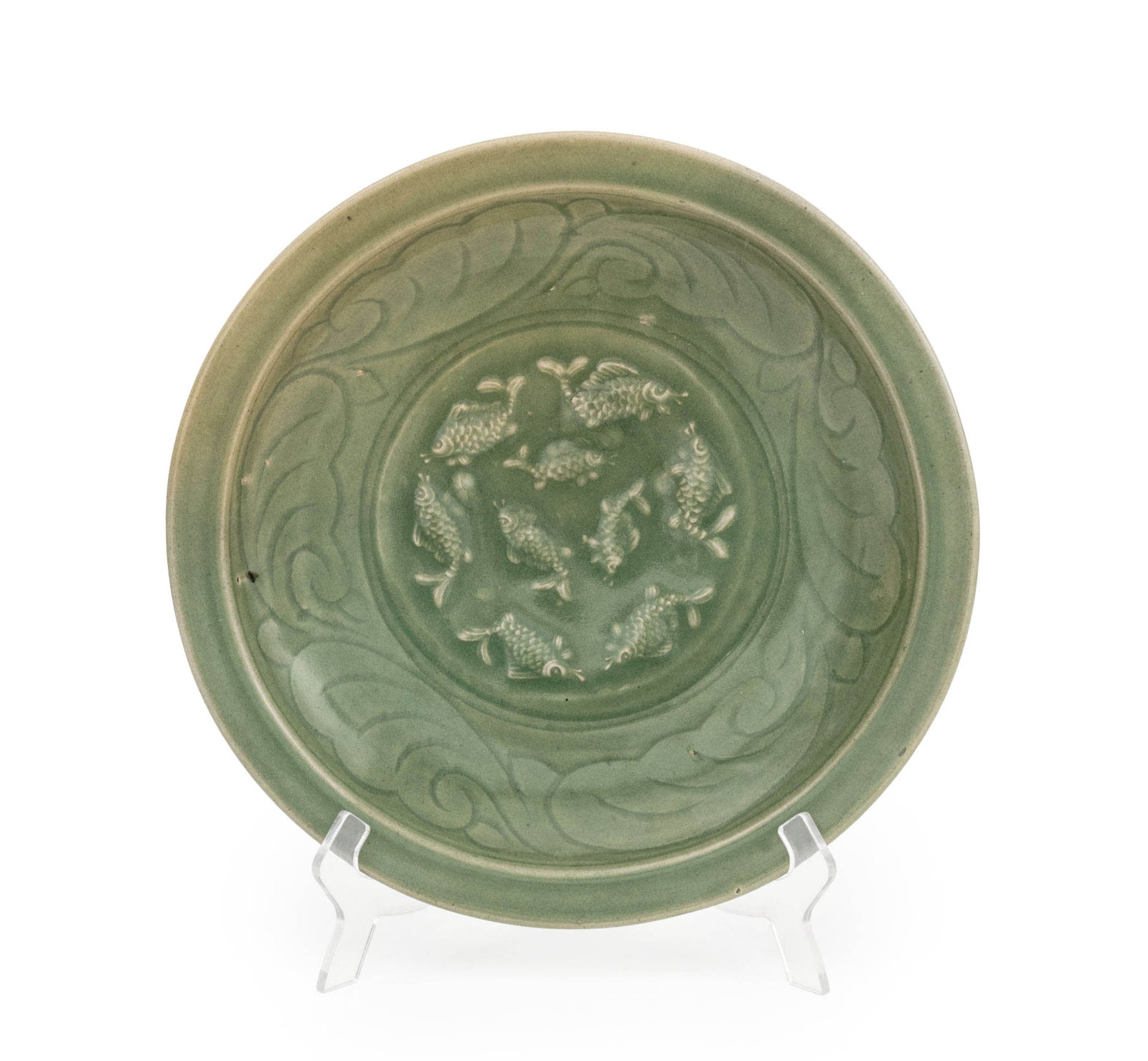 Chinese Longquan Celadon Charger: Chinese Longquan Celadon Glazed Stoneware Charger, probably Ming Dynasty, the well with nine molded fish within incised border. 2.75" H x 15.25" Diameter. Provenance: From an East 57th Street Estate. 