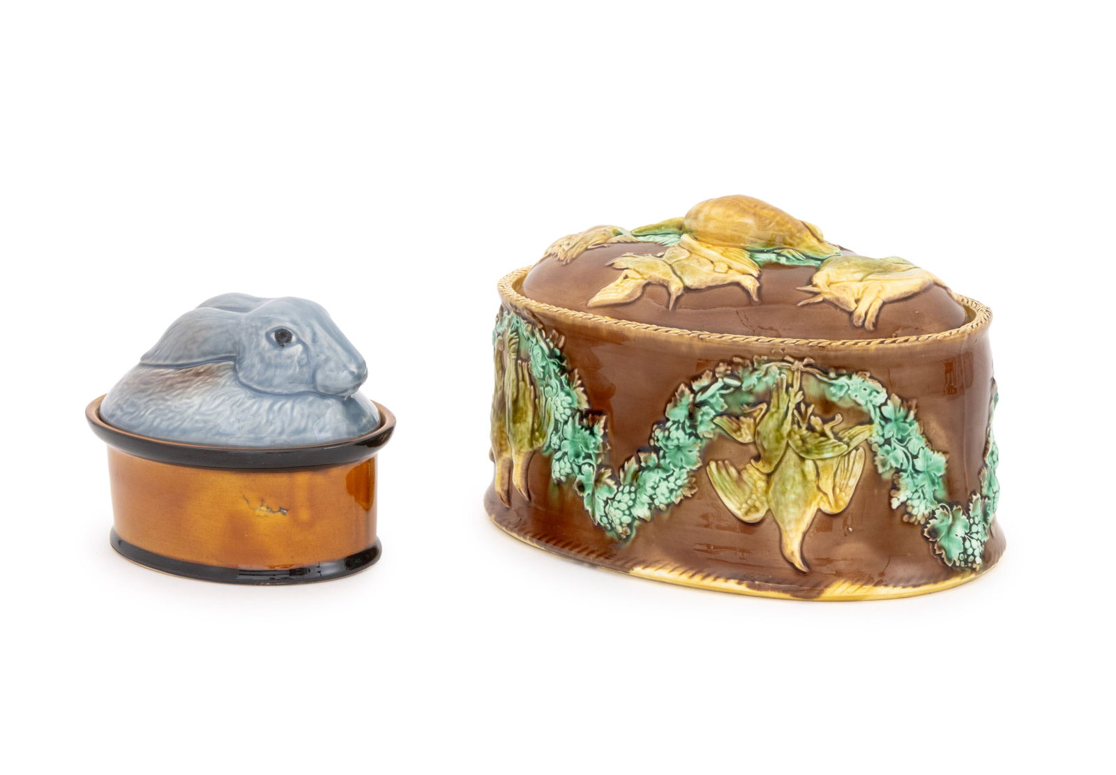 Polychrome Glazed Ceramic Game Pie Dishes, 2: Two Polychrome Glazed Ceramic Game Pie Dishes, one English majolica oval tureen with liner and one Portuguese ceramic rabbit form dish marked "Portugal / S" to underside. Larger: 7.25" H x 10" W x 6.5