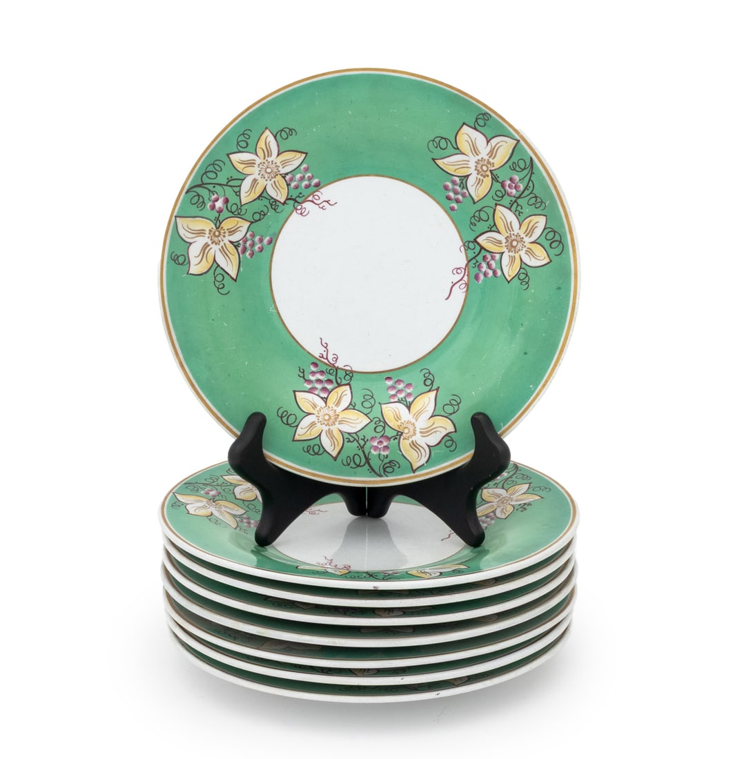 Arts & Crafts Painted Porcelain Plates, 8: Set of Eight Arts and Crafts Painted Porcelain Luncheon Plates, each decorated with flowers and berries on a Jelly green ground with gilt accents and marked "214" to underside. 9" Diameter x 1.25" D.