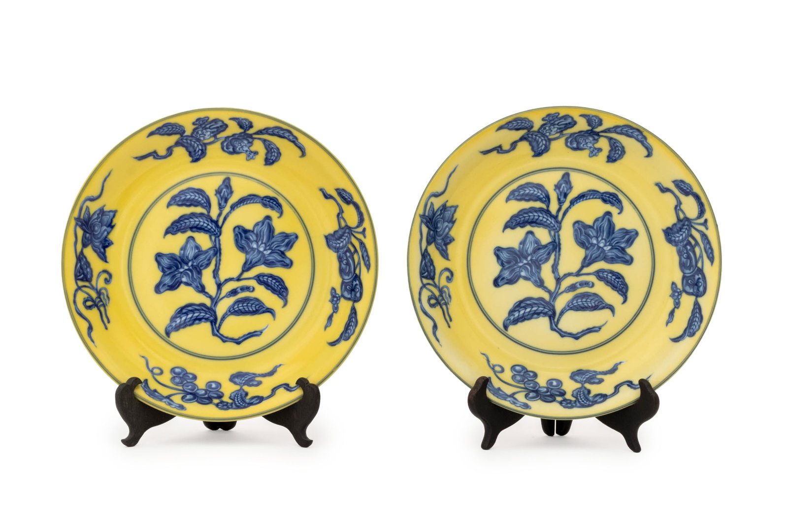 Mottahedeh Porcelain "Gardenia" Plates, Pair: Pair of Mottahedeh "Gardenia" Pattern Porcelain Plates, each with cobalt blue floral decoration on a yellow ground and marked "Reproduction of a Chinese dish, Ming dynasty / Hung-chih period,