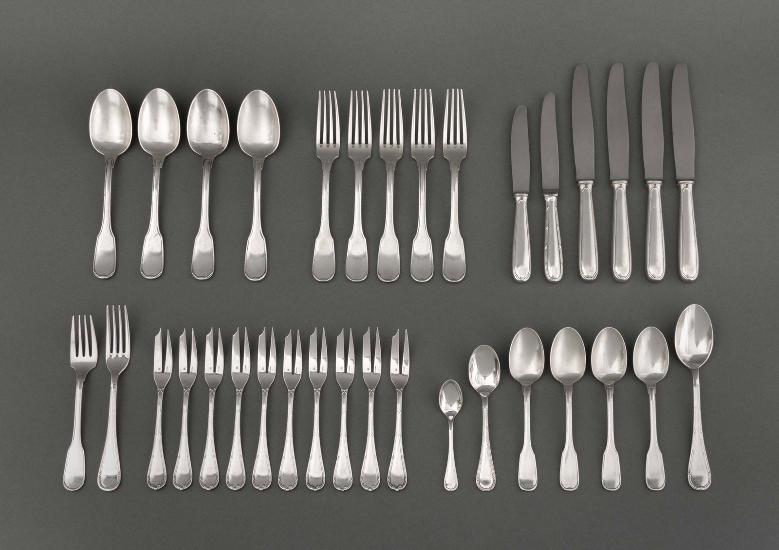 Christofle Silver Plate Flatware Service, 32 Pcs.: Christofle Silver Plate Assembled Flatware Service, comprising: in the "Chinon" pattern, one (1) luncheon fork, five (3) dinner forks, four (4) soup spoons, four (4) teaspoons, four (4) dinner