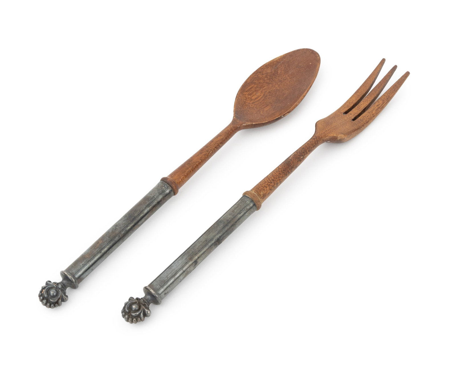 French Silver Serving Flatware Set, 2 Pcs.: French Silver and Wood Serving Flatware Set, spoon and fork, wood with silver handles, each marked "France" to underside. Silver tested. Weight: 5.52 ozt. inclusive; 12" L x 2" W x 0.5" D.