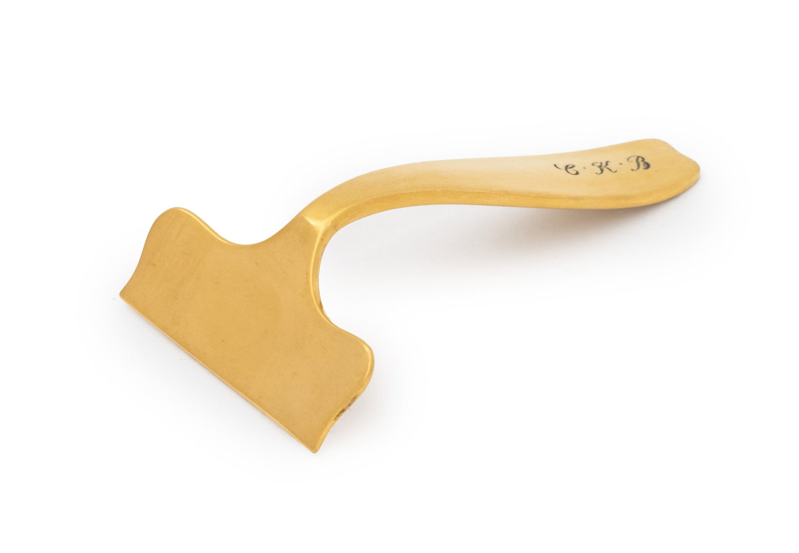 Tiffany & Co. Sterling Silver Gilt Food Pusher: Tiffany and Company Sterling Silver Gilt Baby Food Pusher, first half 20th century, the handle monogrammed "C K B" to handle and marked "Tiffany & Co. Sterling M" to reverse. Weight: 0.66 ozt.; 2.75" 
